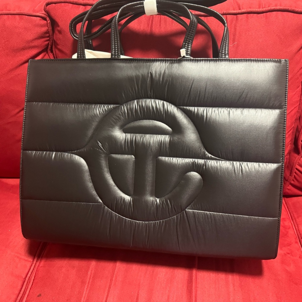 Brand new puff Teflar handbag